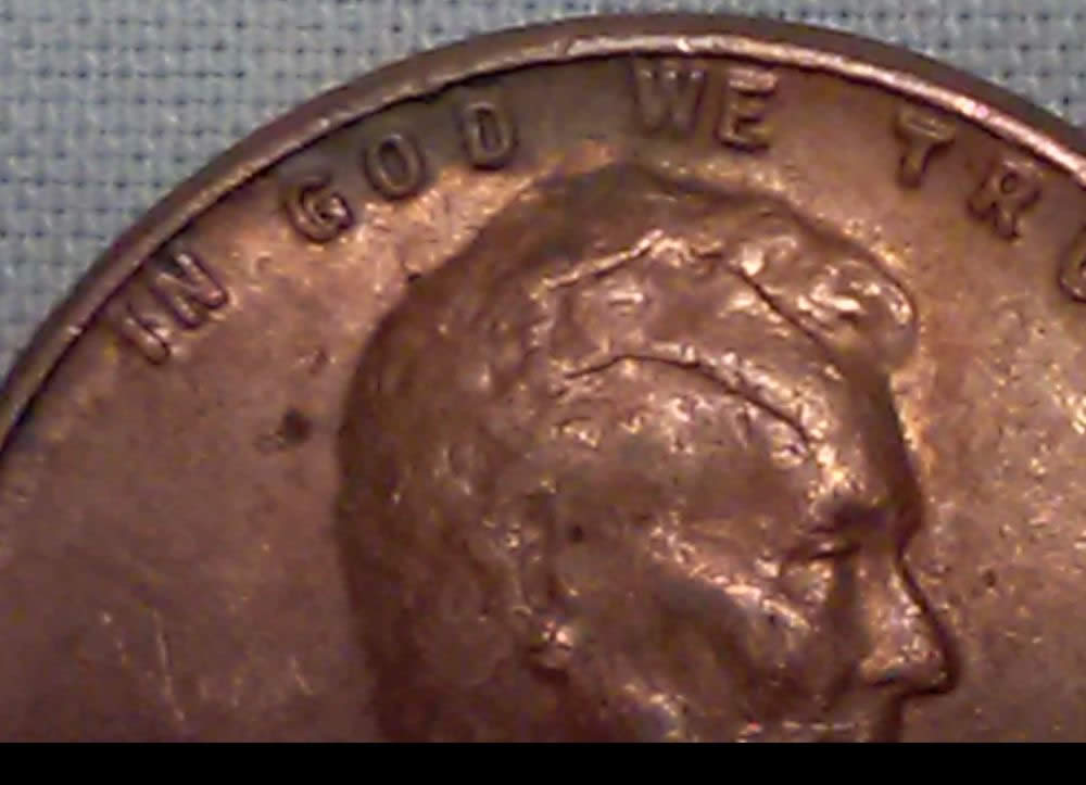 1955-P-Lincoln-Wheat-Cent-With-Severe-Cracked-Skull-And-A-RIDB-On-Reverse